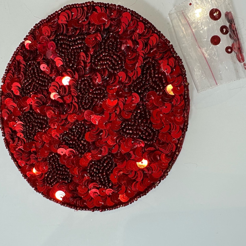 Kim Seybert set a red sequin four coasters 5 inches new
